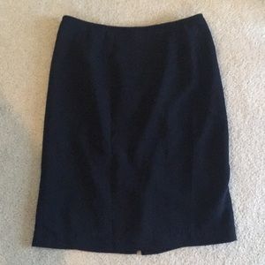 Knee length black skirt